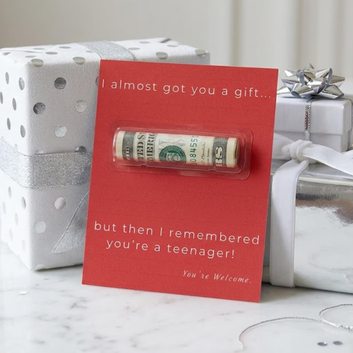 Money holder card that reads "I almost got you a gift...but then I remembered you're a teenager! You're Welcome."