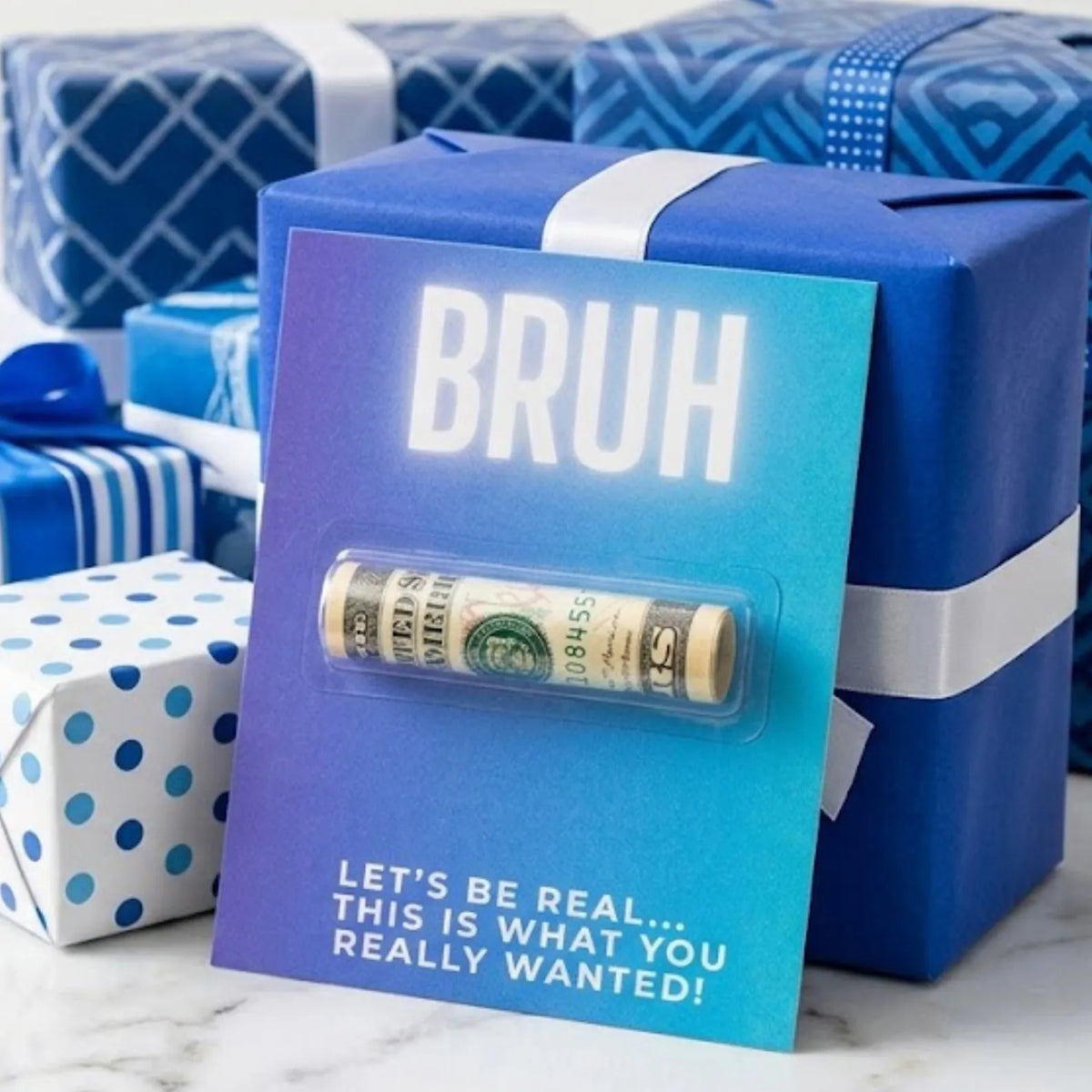A humorous gift card reading 'BRUH LET'S BE REAL.